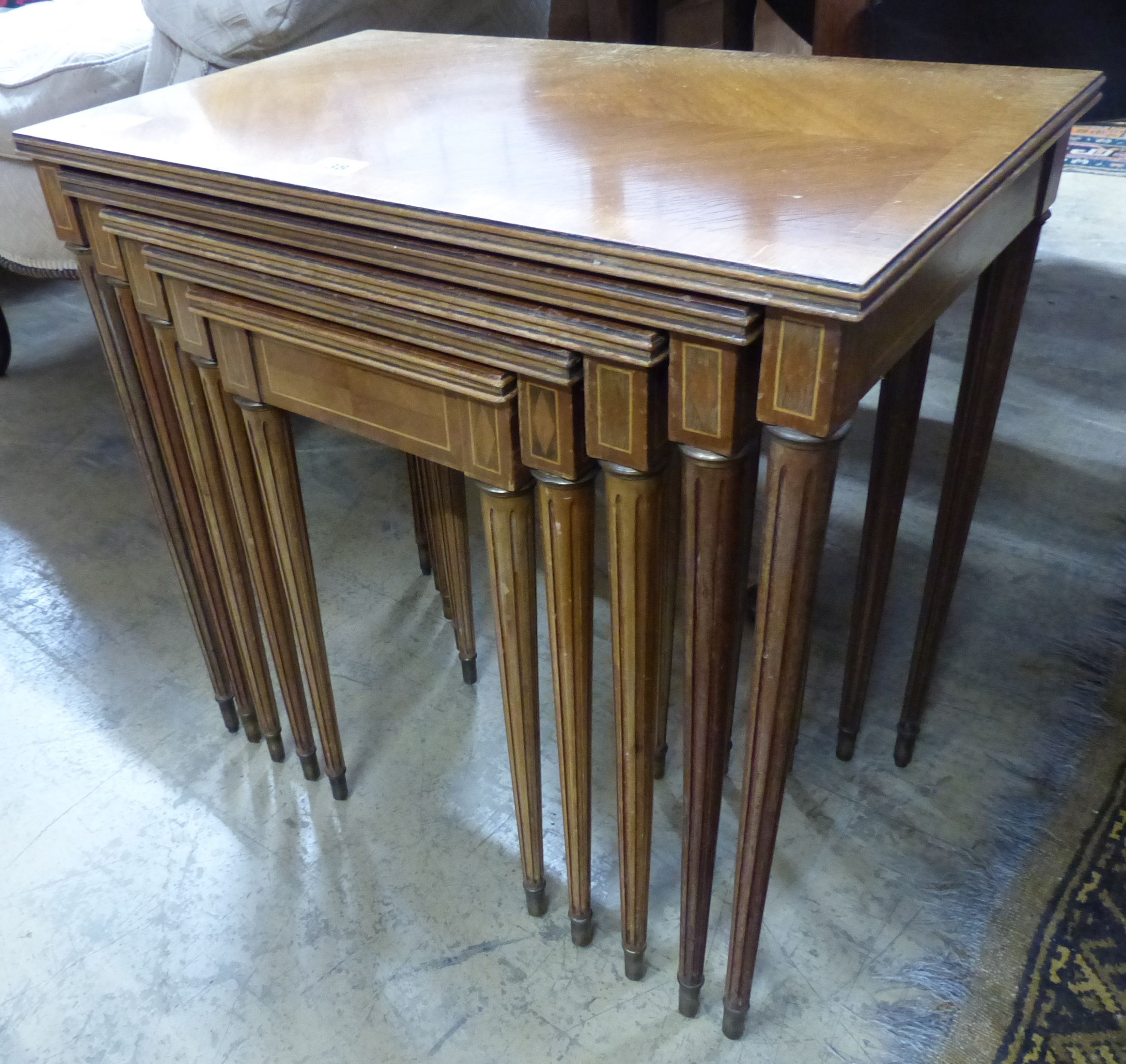 A quartetto of banded and inlaid mahogany tea tables, W.59cm D.37cm H.57cm